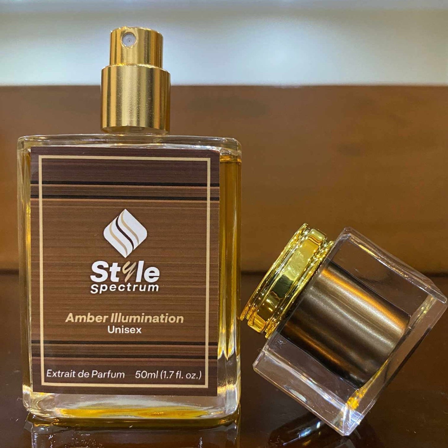 Amber Illumination perfume bottle showcasing sweet and woody fragrance