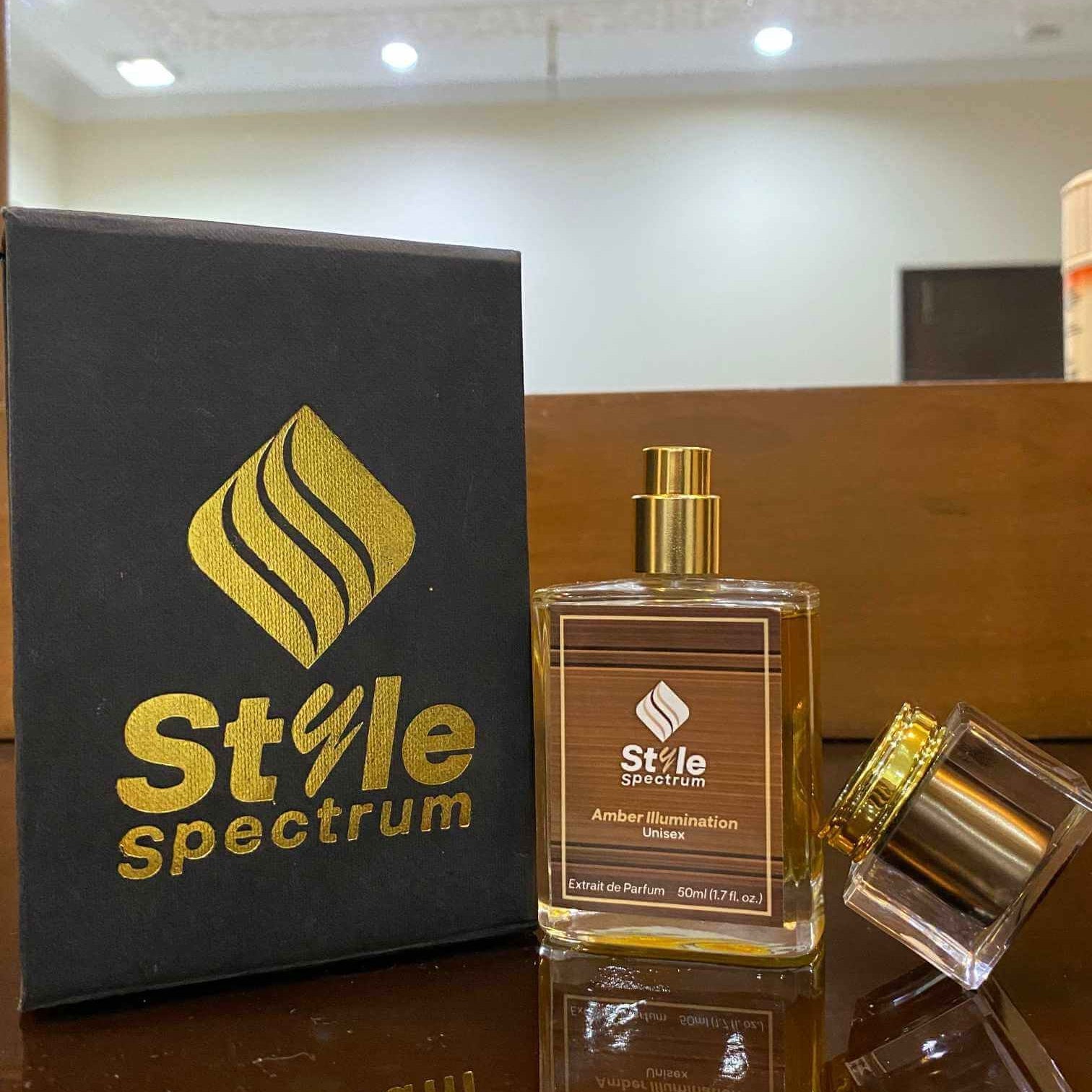 Amber Illumination perfume with packaging box, highlighting unisex scent