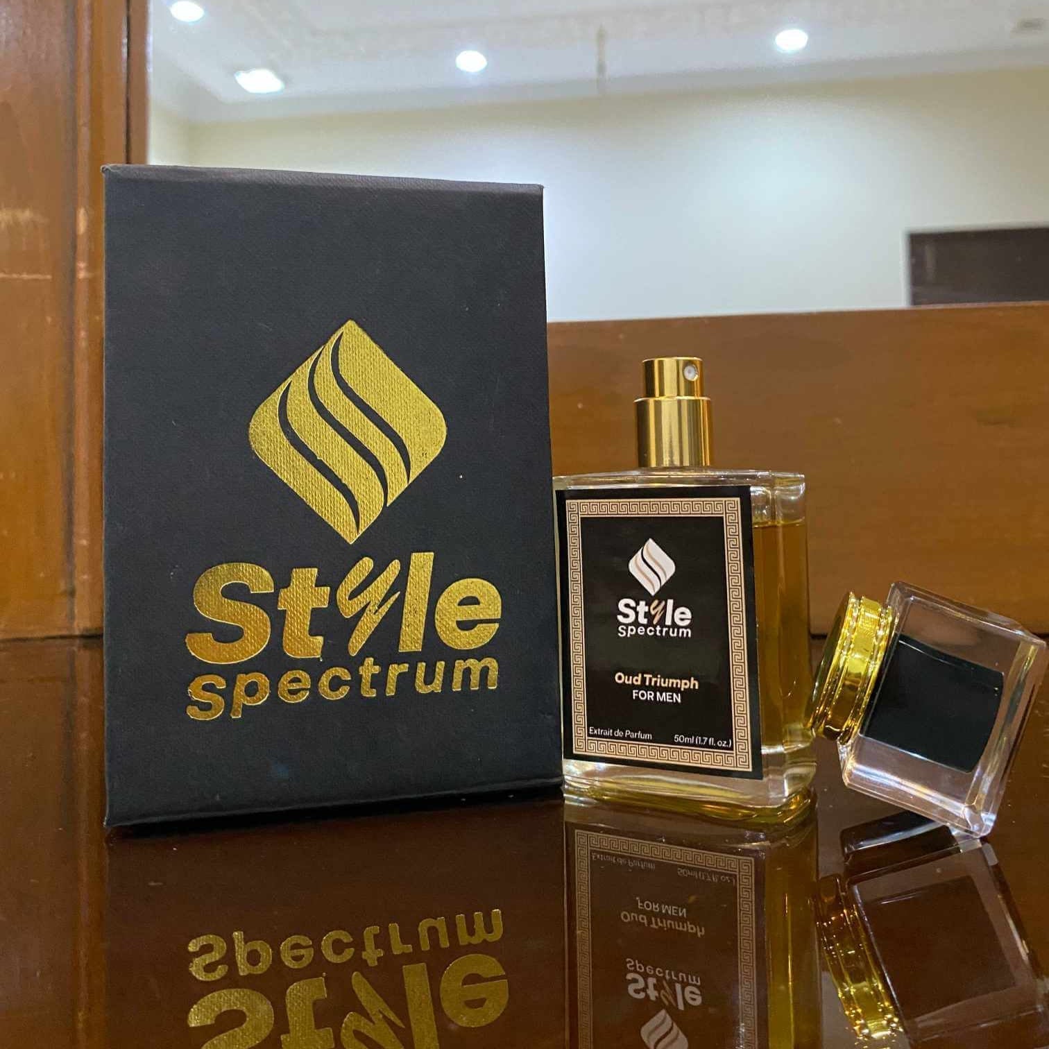 Oud Triumph perfume alongside its packaging box, ideal for office and party wear